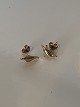 Earrings in #14 
carat white 
gold with 
brilliant
Stamped 585
Height 5.18 mm
Width 5.18 mm 
...