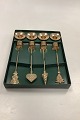 4 Georg Jensen 
Lyseholdere til 
Adventskrans i 
Forgyldt metal.
Snemand, 
Flettet hjerte, 
...