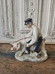 Royal 
Copenhagen 
figur - 
Svinedreng med 
so 
No. 848, 4. 
sortering - 
personale 
sortering
Højde ...