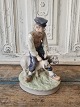 Royal 
Copenhagen 
figur - Bonde 
med får 
No. 627, 4. 
sortering - 
Personale 
sortering
Højde 20 ...