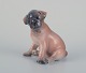 Royal 
Copenhagen, 
porcelænsfigur 
af 
bokser-hvalp. 
Model 3169.
Ca. 1930.
Stemplet.
Første ...