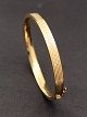 9 karat guld 
armring 6,2 x 
5,4 cm. B. 0,6 
cm. flot stand 
emne nr. 538055
