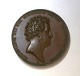 Danmark. 
Christian VIII. 
Minerva og en 
genius. 1842. 
Bronze. 
Diameter 43 mm