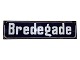 Buet blåt 
emaljeskilt 
"Bredegade".
Måler 48,0 x 
12,0 cm.
Der er 
afskalninger i 
hjørnerne, ...