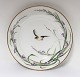 Royal Copenhagen. Middagstallerkner med fuglemotiv. Diameter 23 cm. Produceret 
ca. 1850. (1  sortering)