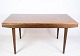 Spisebord i 
palisander af 
dansk design 
med 2 
tillægsplader 
fra omkring 
1960'erne. 
Mål i cm: ...