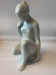 Royal Dux. Seated woman 
Height approx. 26 cm
The stamp. 737
