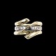 Georg Jensen. 
Ring i 18k guld 
med brillanter. 
- Magic #1314 - 
52mm.
Ydre Ring i 
18k ...