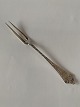 Antique meat 
fork in Silver
Length approx. 
17.5 cm
Nice and 
polished 
condition
Packed in bag