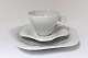 Royal Copenhagen. White Conch. Design Arje Griegst. Mocha cup, saucer and cake 
plate.  Model 14179 + 14176. (1 quality).
