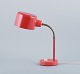 Svensk 
designer, 
bordlampe i 
retrostil. 
Orange lak.