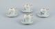 Bing og 
Grøndahl, et 
sæt på fire 
antikke 
kaffekopper med 
høj hank med 
tilhørende 
underkopper. 
...