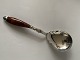 Serving spoon 
in silver
Stamped 3 
towers CFH
Length approx. 
25.8 cm
Produced in 
the year ...