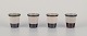 Bing & 
Grøndahl, 
"Tema". Four 
egg cups in 
stoneware.