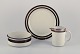 Arabia, 
Finland. Three 
pieces of 
"Karelia" 
stoneware. ...