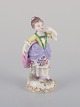 Antik tysk 
porcelænsfigur. 
Ung kvinde i 
fine klæder. 
...