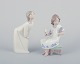 To Lladro 
porcelænsfigurer 
af unge 
kvinder. 
Håndlavet.