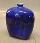 Kgl. Kongelig 
Dansk vase form 
134 med dyb blå 
isglasur 15 x 
12 cm fra  
Royal 
Copenhagen I 
hel og ...