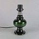 Mørk grøn lampe 
i mundblæst 
glas
Model Monique
Producent 
Holmegaard
Grøn cylinder 
formet ...