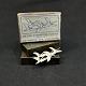 Længde 6 cm.
Stemplet EM 
for Erik 
Magnussen, 
Sterling, 
eneret og Made 
in Denmark.
Brochen ...