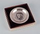 Bernard Buffet 
(1928-1999), 
French artist.
Year plate in 
sterling 
silver. 1976.
Engraved image 
...