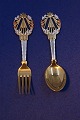 Michelsen set Christmas spoon and fork 1922 of 
Danish gilt sterling silver