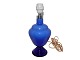 Holmegaard 
Florence 
bordlampe i 
blåt glas. 
Prototype med 
anderledes fod 
og top. Denne 
blev solgt ...