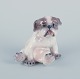 Dahl Jensen, 
porcelænsfigur 
af 
pekingeserhvalp.
