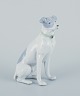 Fritz og Ilse 
Pfeffer, Gotha, 
Tyskland. 
Porcelænsfigur 
af stående 
hund. 
Figuren er 
produceret ...