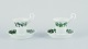 Meissen, Green 
Ivy Vine, two 
coffee cups 
with tall 
handles shaped 
like swans. 
With ...
