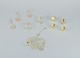 Royal Copenhagen "Royal Christmas". Set of ten brass Christmas ornaments for hanging on the ...