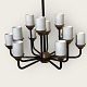 Modern chandelier
Black metal, copper and white opal glass.
DKK 1200