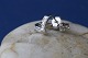 Beautiful 
earrings in 14 
carat white 
gold, with 3 
diamonds and a 
nice curved 
shape. The 
earrings ...
