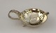 Georg Jensen. 
Sterling (925). 
Saltkar med 
saltske. Design 
110. Diameter 5 
cm.