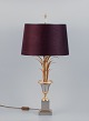 Maison Jansen 
stil. Stor 
bordlampe i 
messing, stamme 
i form af 
palmeblade, 
tekstil ...