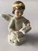 Porcelænsfigur 
fra Royal 
Copenhagen, 
engel med 
nodepapir. 
Julefiguren er 
fra 
engleserien, 
der ...
