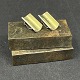 Længde 2,5 cm.
Stemplet Hans 
Hansen 925S for 
sterlingsølv, 
Denmark.
Sættet er med 
buet ...