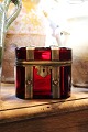 Antique sugar box in red glass with bronze mountings...