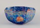 Rosenthal, 
Tyskland. Stor 
porcelænsskål i 
lustre-glasur. 
Hånddekoreret 
med 
frugtmotiver og 
...
