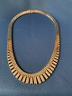 Necklace in 14 carat gold, bricks in 7 rows, with process, stamped 585 JTH. 
Length 41 cm.