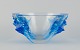 Marc Lalique, France. Colossal and impressive "Haiti" art glass bowl in clear 
crystal with inclusions of electric blue. Rare model.