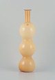 Murano/Venini, Italy.
Large hand-blown ochre yellow art glass vase. Triple gourd-shaped.