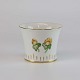 Vase fra 
stellet 
Erantis. No 41
Design Bing & 
Grøndahl
Hvidt porcelæn 
i skælform med 
...