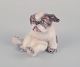Dahl Jensen. 
Porcelænsfigur 
af 
pekingeserhvalp.
