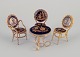 Limoges, 
Frankrig.  
Miniature bord 
og stole i 
messing og 
porcelæn. 
Dekoreret i 
22-karat ...