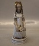 12461 Kgl. 
Huguenot pige 
21 cm Arno 
Malinowski 1927 
figur fra Royal 
Copenhagen I 
hel og fin ...