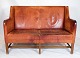 Vintage design 
to-personers 
sofa model 5011 
skabt af Kaare 
Klint. Dette 
ikoniske stykke 
er lavet ...