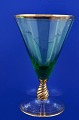 Ida vinservice 
fra Holmegaard. 
Tegnet af : 
Jacob E. Bang 
1935.
Ida glas med 
guld 
fremstillet ...