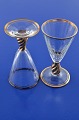 Ida vinservice 
fra Holmegaard 
glasværk. 
Tegnet af : 
Jacob E. Bang 
1935.
Ida glas med 
guld ...