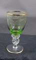 Mågeglas med 
guldkant fra 
Lyngby 
glasværk. 
Hvidvinsglas 
med grøn kumme 
i pæn stand.
H 12,5cm ...